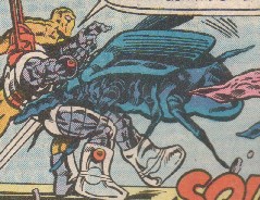 A battle-beetle lunges at Huntarr and Acroyear